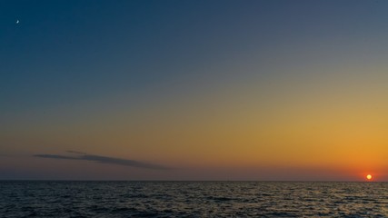 View of Sun and Moon on the Black Sea, Sunset in Sochi
