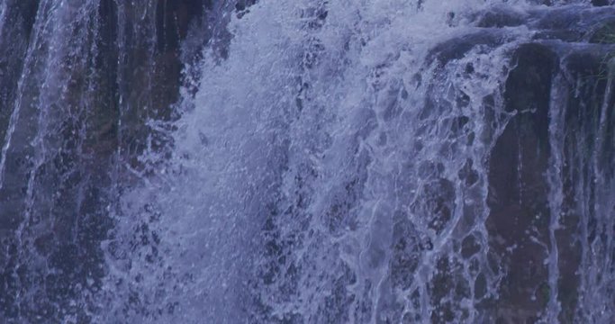 wild river waterfall with fresh drinking water closeup slow motion calm relaxing backgrond