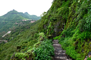 Beautiful landscape aerial, and closeup Photos of nature, roads, grass, trees, village, and farm land. Lush green monsoon nature mountains, hills, Purandar fort, Pune, Maharashtra, India