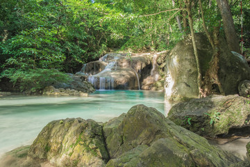 Erawan waterfall is a large and beautiful on the banks of Kwai Yai river, it is located in Si sawat District, Kanchanaburi province, Thailand.