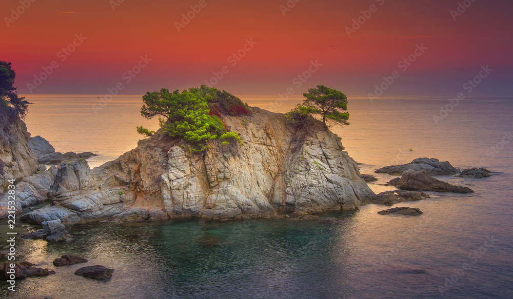 Wall mural sea landscape at sunrise. beautiful view of cliff in mediterranean at dawn in morning. bright red sk - Wall murals
