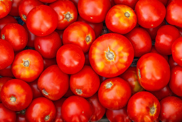 A pile of tomatoes close up