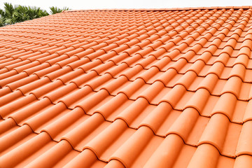 Closeup of new red color clay ceramic roof - obrazy, fototapety, plakaty