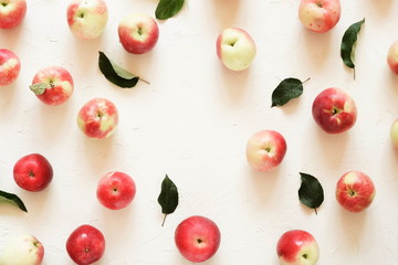 Red apples pattern on white vintage background.Top view.Copy space. flat lay