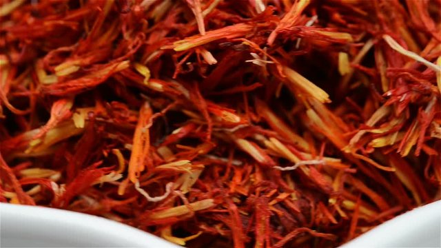 Chinese herb medicine of Carthami Flos or Safflower rotating close up
