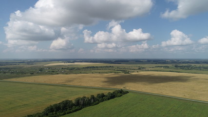 Fototapeta na wymiar Aerial view, fields, clouds