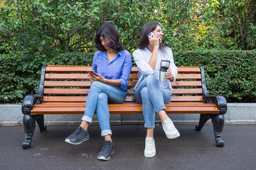 Two middle-aged women talking