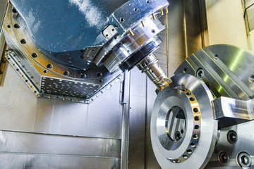 CNC Router and turning metal with a cutting tool and centering tool. The concept of high-tech...