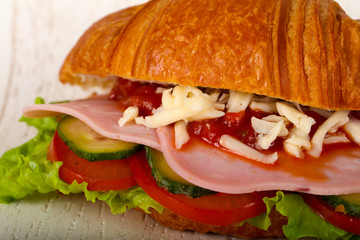 Croissat with ham and cheese