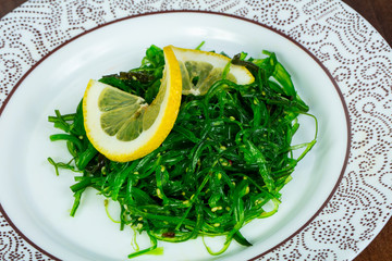 Chuka salad served lemon