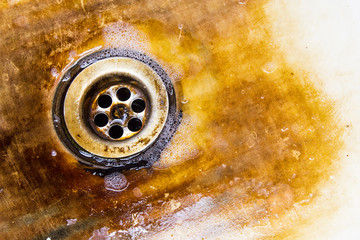 A rusty old sink in the kitchen