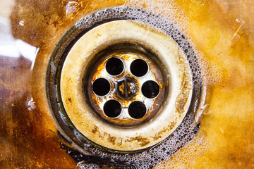 A rusty old sink in the kitchen