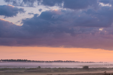 Scenic view of cloudy morning sky in countryside 
