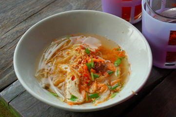 Traditional food in the floating market in Amphawa near Bangkok in Thailand