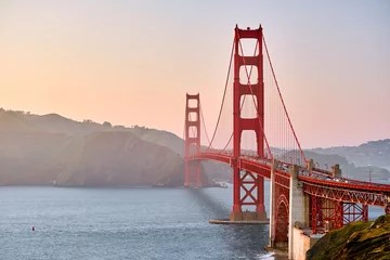 Zelfklevend Fotobehang Golden Gate Bridge bij zonsondergang, San Francisco, Californië © haveseen