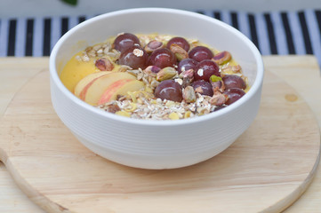 mango yogurt with oat,grape and apple