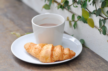 croissant and hot cocoa