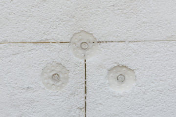 Insulation of the house with styrofoam. Energy saving concept. Closeup