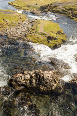 Fototapeta na wymiar Kirkjufellsfoss waterfall near the Kirkjufell mountain on the north coast of Iceland's Snaefellsnes peninsula