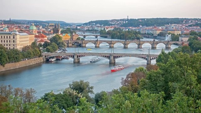 Bridges of Prague including the famous Charles Bridge over the River Vitava Czech Republic at sunset - time lapse. day to night. , Europe