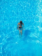 woman swimming in the pool
