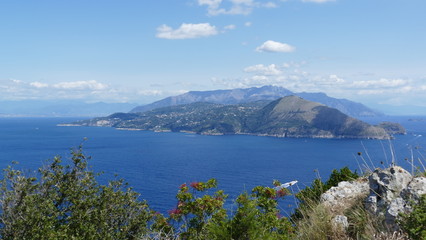 Fototapeta na wymiar Capri mediterranean view on the sea over to the italian coast of amalfi