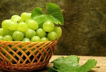 Grapes fruit with leaf like autumn  background 