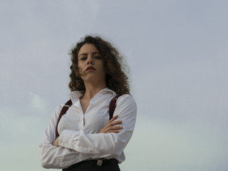 girl with folded arms serious expression body language