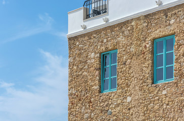Fassade aus Natursteinen an einem mediterranen Haus
