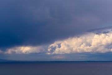 Fototapeta premium Storm clouds gather over the sea.