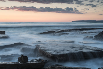 Beautiful dramatic Sunset over a rocky coast