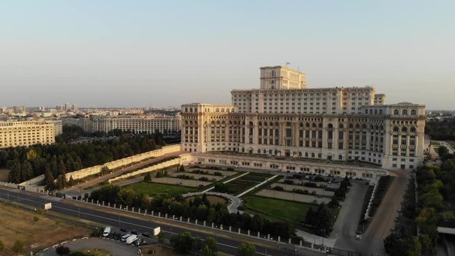 Parliament building or People's House in Bucharest city. Aerial view at sunset