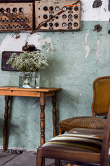 wooden, rustic chair and table in vintage living room