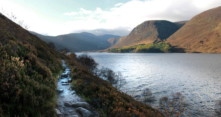 Scottish landscape panorama. Loch Muick in Cairngorms National Park. Royal Deeside, Ballater, Aberdeenshire, Scotland, United Kingdom.