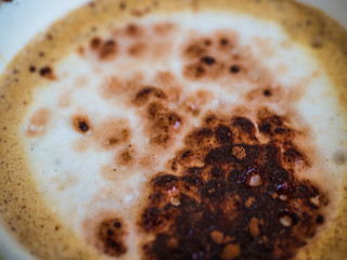 Cappuccino with milk froth, sprinkle with coffee powder