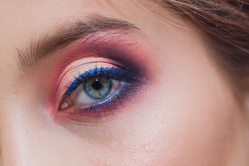 Obraz premium blue woman single eye close up