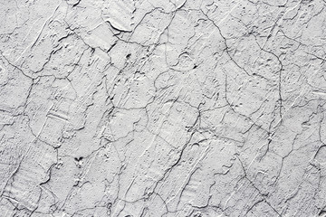 Old concrete wall textured gray and cracks covered surface.