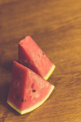 big piece of watermelon on wooden background. rustic style