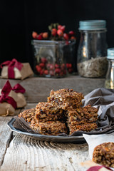 Flapjack of oats, pumpkin seeds, sunflower seeds and dried fruit, in gift packets for Christmas 