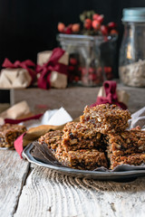 Flapjack of oats, pumpkin seeds, sunflower seeds and dried fruit, in gift packets for Christmas 