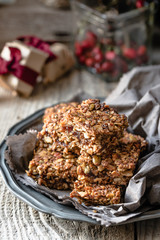 Flapjack of oats, pumpkin seeds, sunflower seeds and dried fruit, in gift packets for Christmas 
