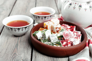 Turkish delight on a wooden table.