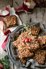 Flapjack of oats, pumpkin seeds, sunflower seeds and dried fruit, in gift packets for Christmas 