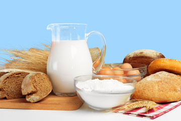 Bread and milk on the table