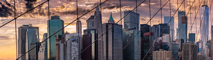 Panorama of the NYC skyline from the Brooklyn Bridge.
