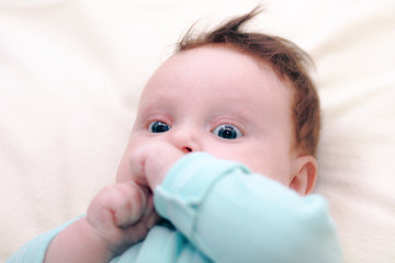 Portrait of the baby of the girl. Cute baby girl.