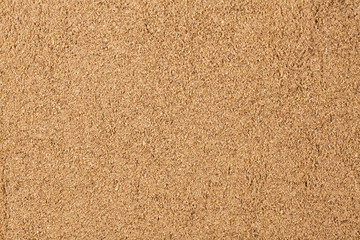 Texture background. brown cinnamon powder Top view