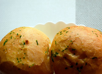 Rustic bread with herbs. Garlic buns.