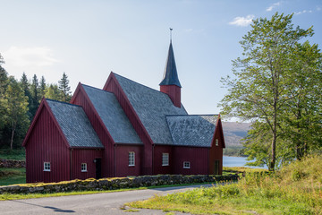 Fototapeta na wymiar Old Wooden Velfjord church in Northern Norway 