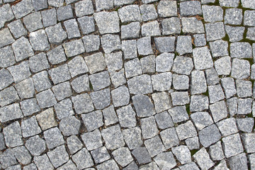 close up on a vintage block stone pavement. top view